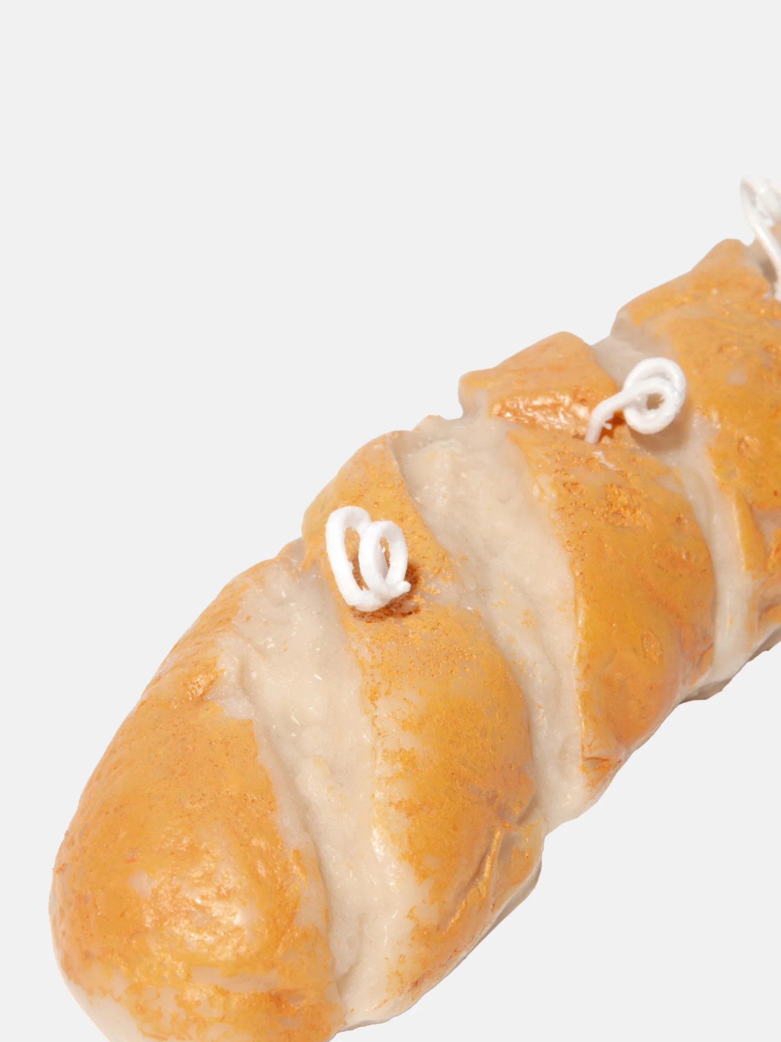 Bougie en forme de baguette