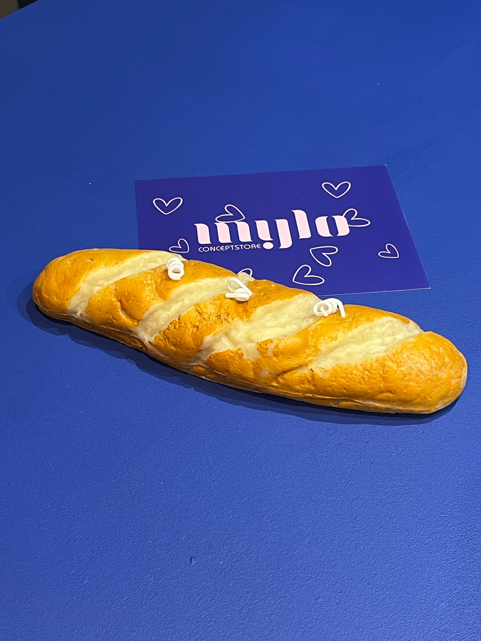 Bougie en forme de baguette