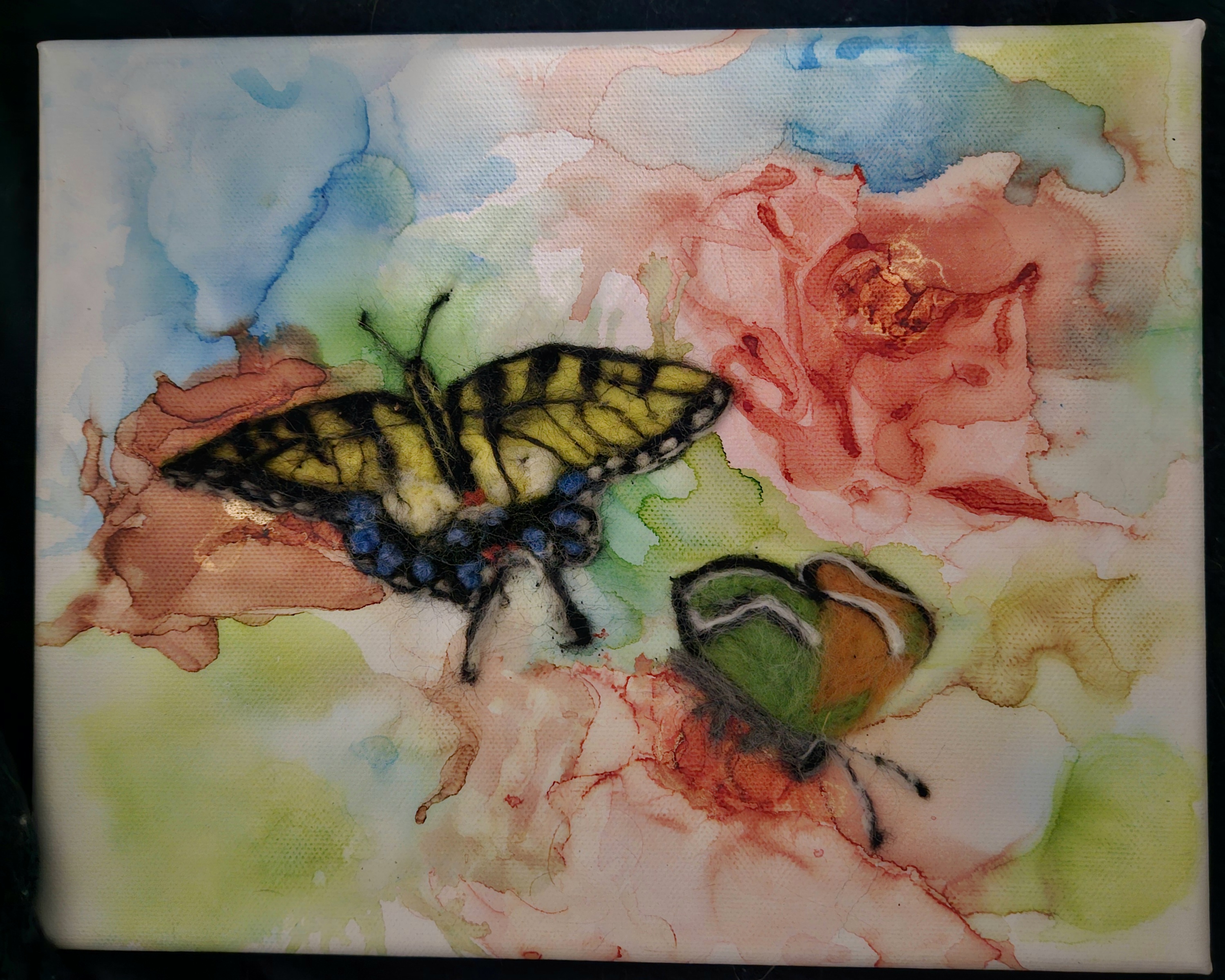 Felt butterfly on Alcohol ink canvas