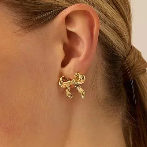 Pendientes de lazo dorado