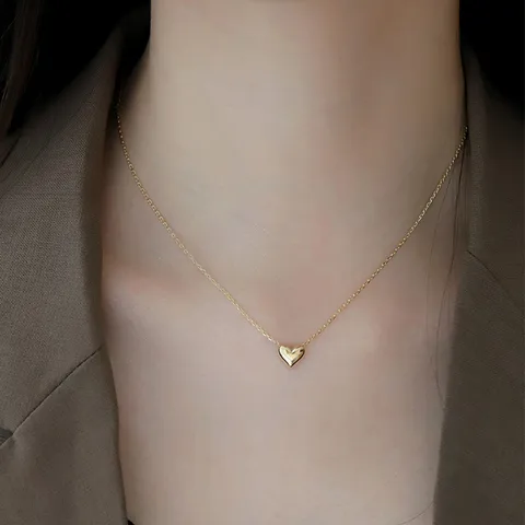 Collar de corazón dorado