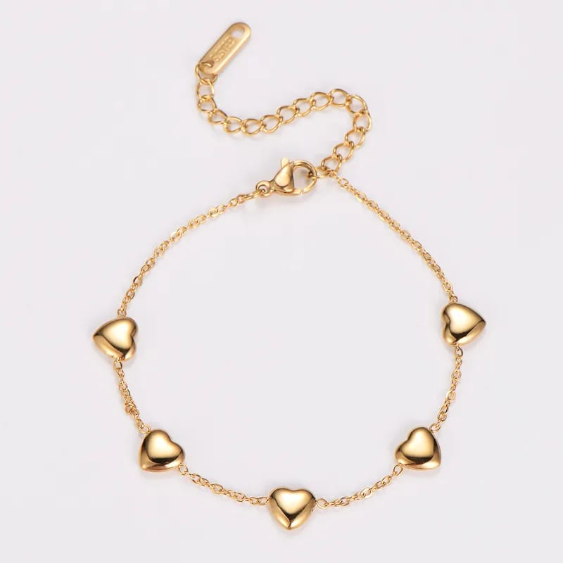 Pulsera de corazones dorados