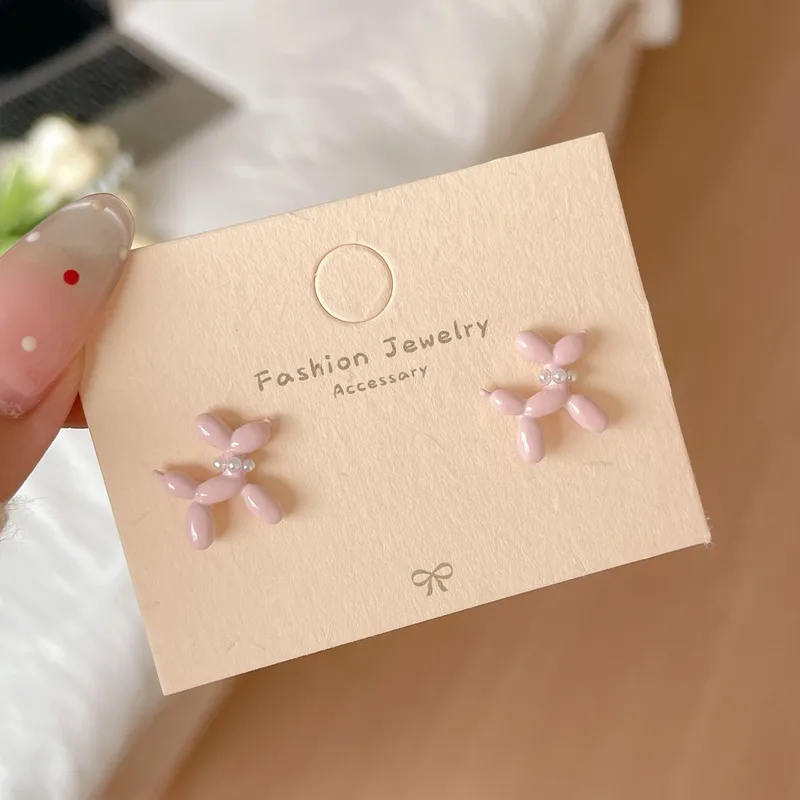 Aretes de forma creativa de color rosa