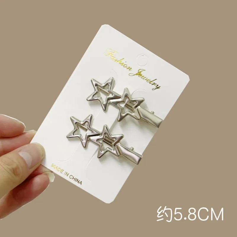 Pinzas para el cabello con diseño de estrella