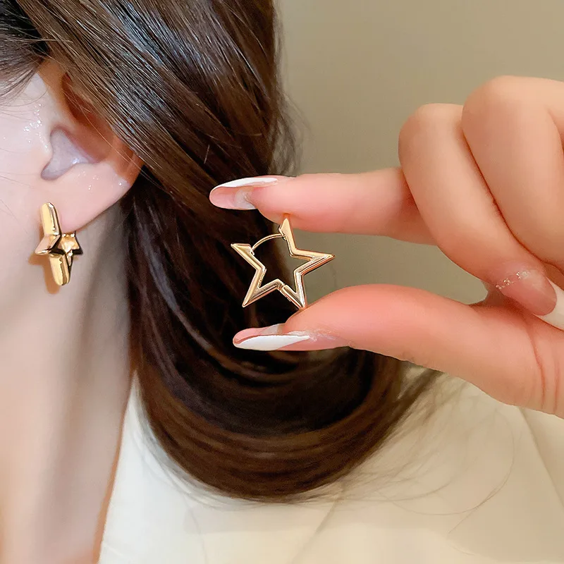 Pendientes de estrella dorados