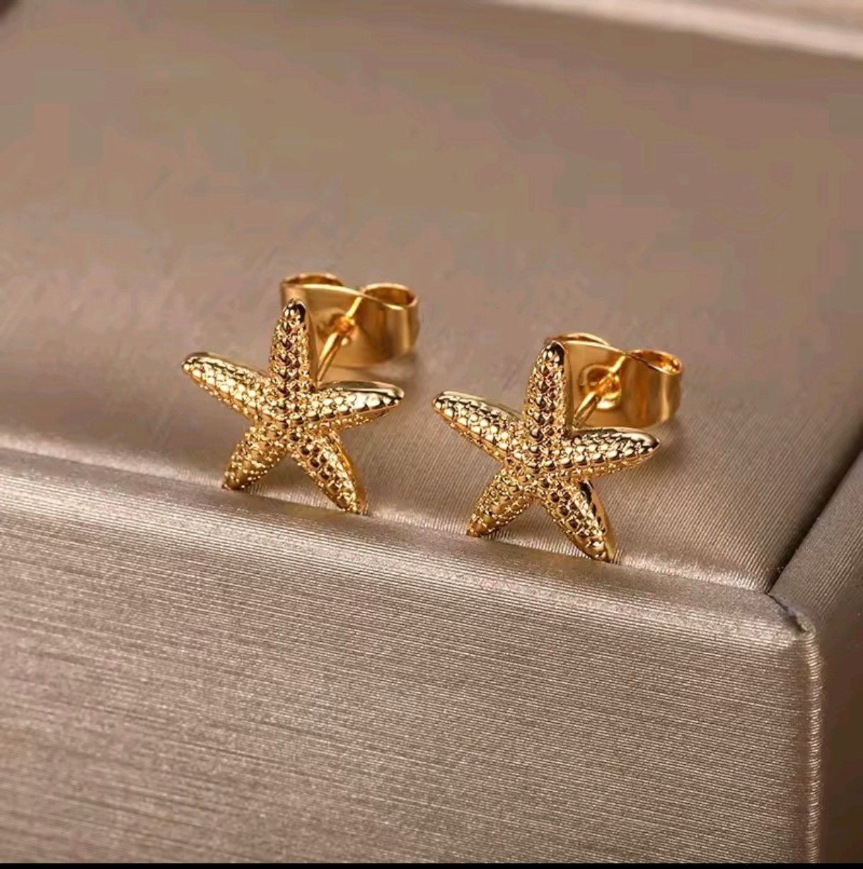 Pendientes de estrella de mar dorados