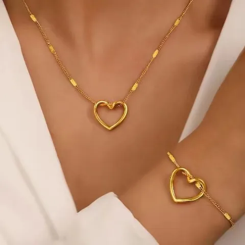 Conjunto de collar y pulsera de corazón dorado
