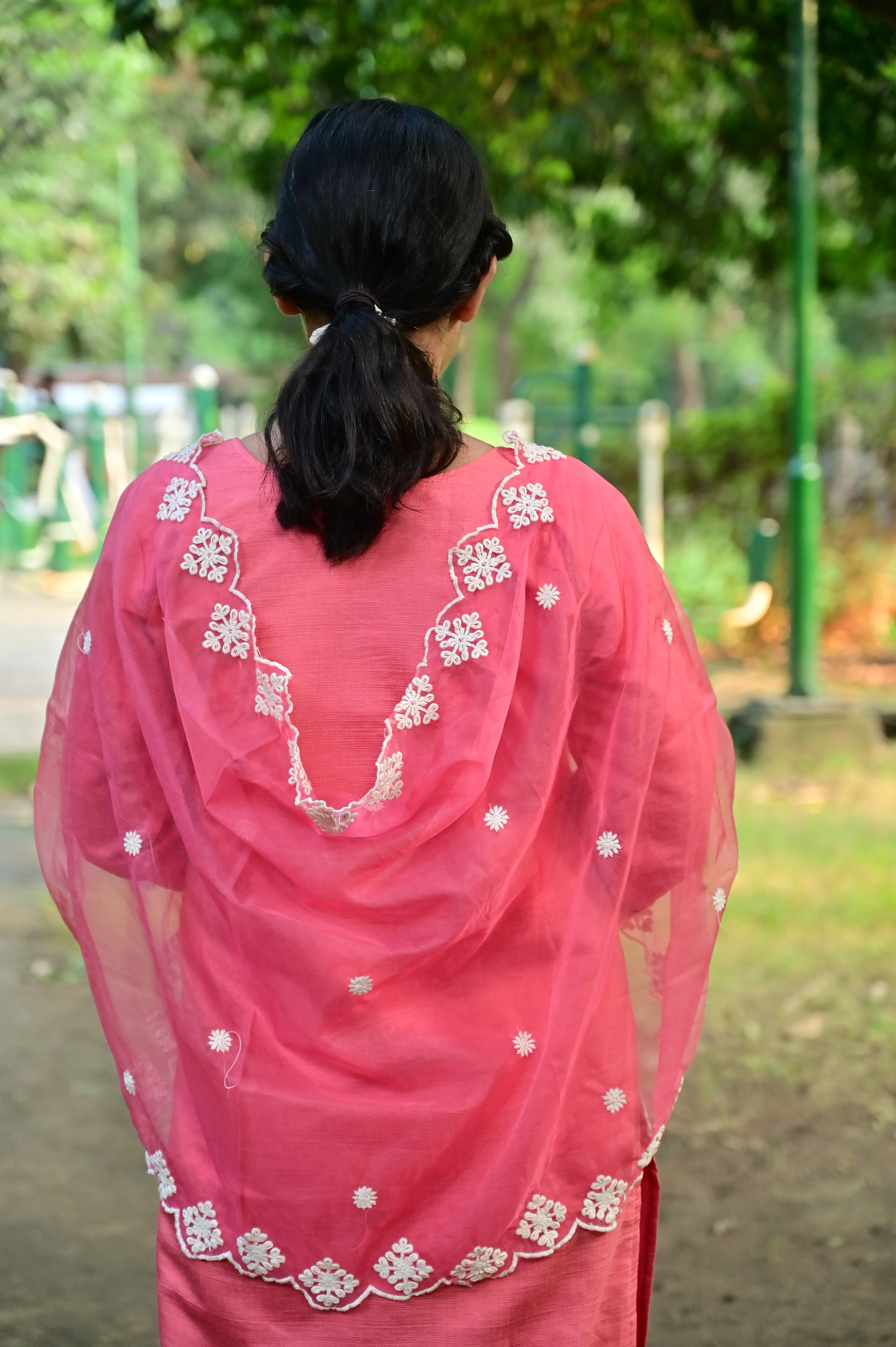 Elegant coral pink kurta pant set with embroidered details
