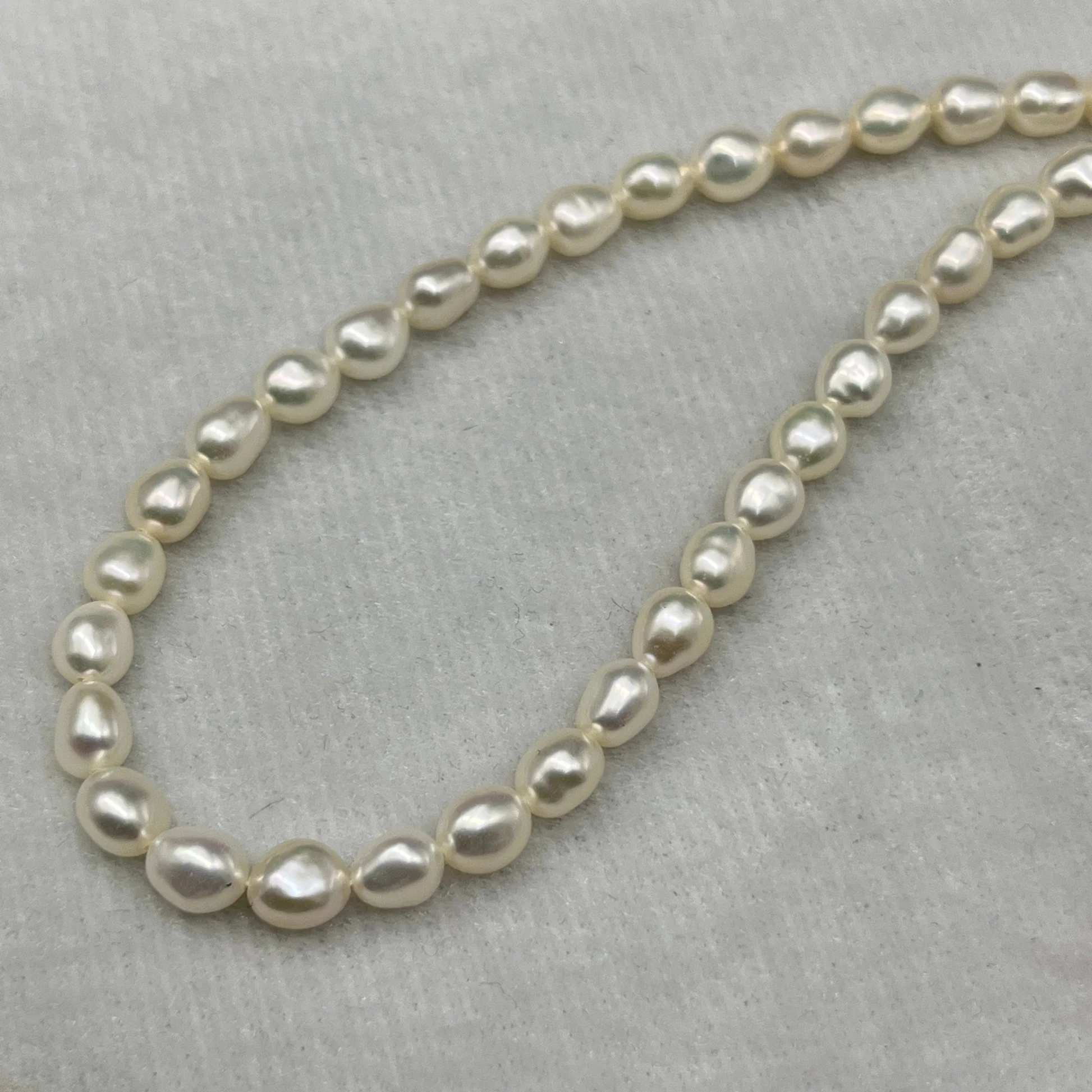 Fresh Water Pearl Cream Color, Rice Shape, AA Luster Pearl, 5.5-6 MM Size