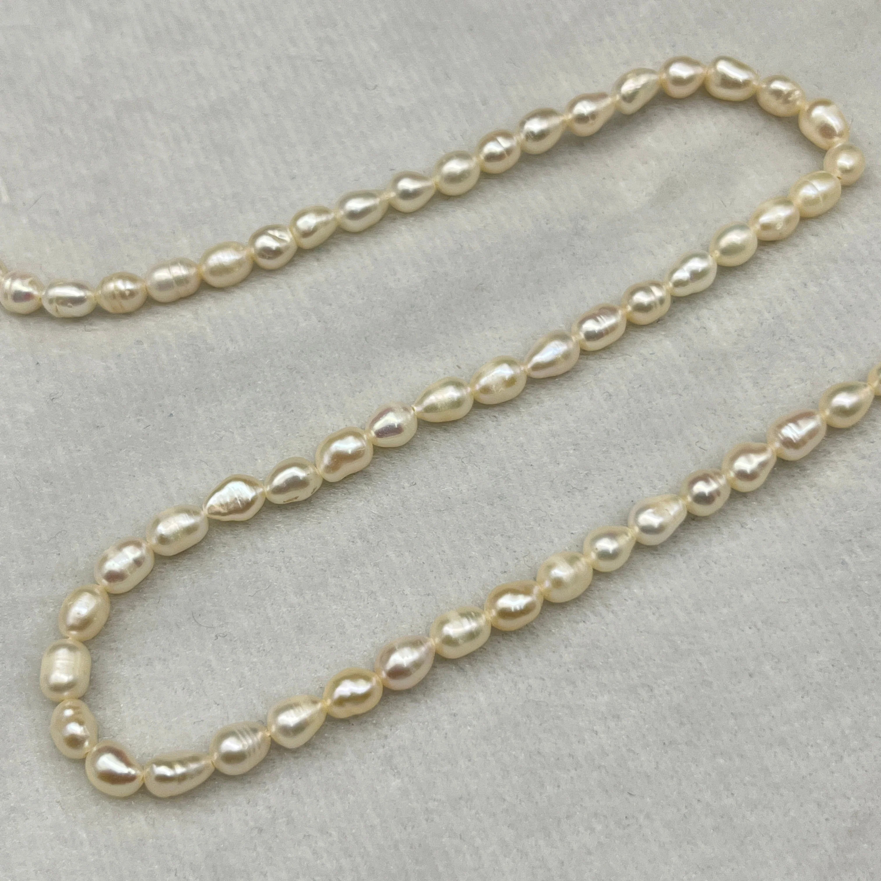 Fresh Water Pearl Cream Color, Rice Shape, A Luster Pearl, 4-4.5 MM Size