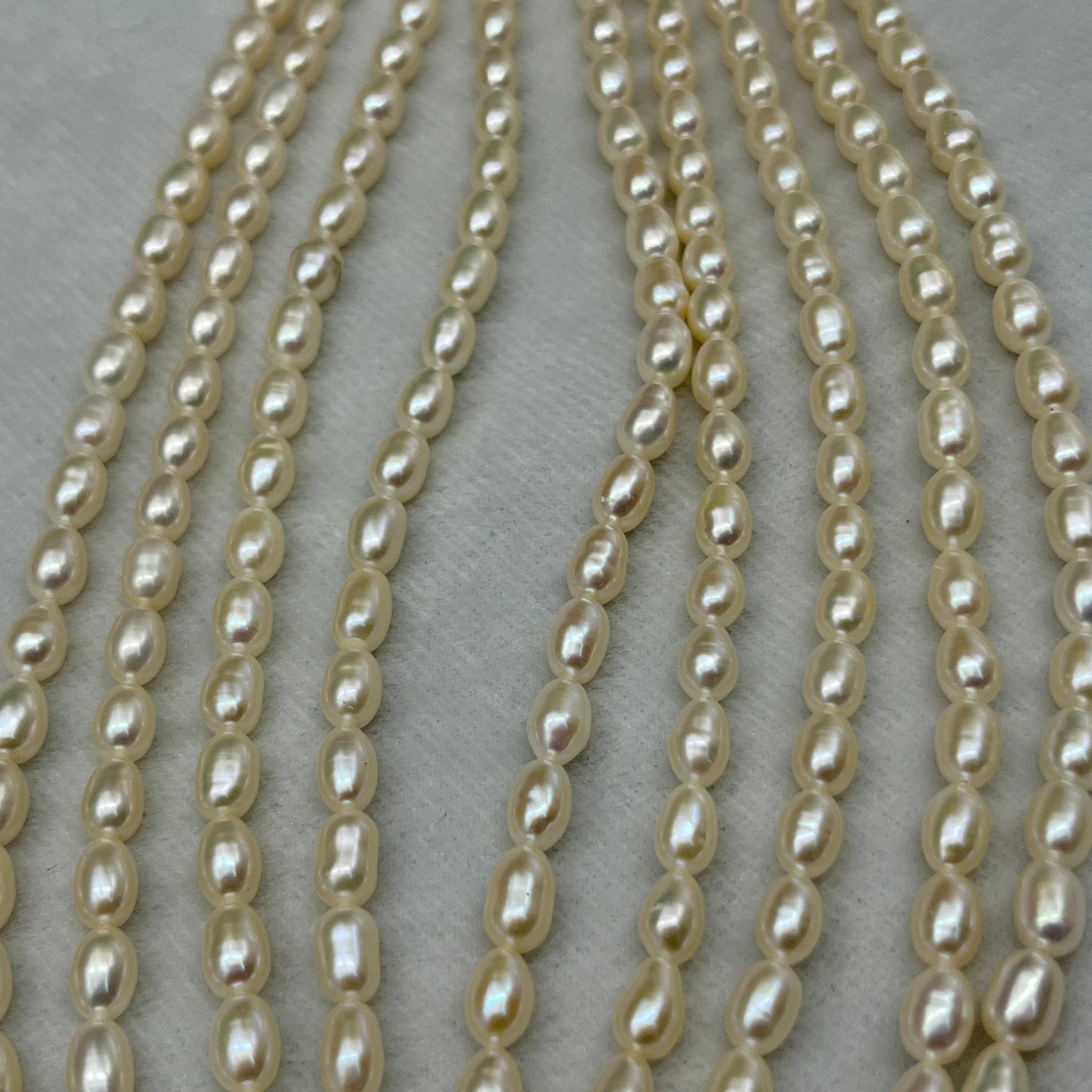 Fresh Water Pearl Cream Color, Rice Shape, AA Luster Pearl, 5-5.5 MM Size