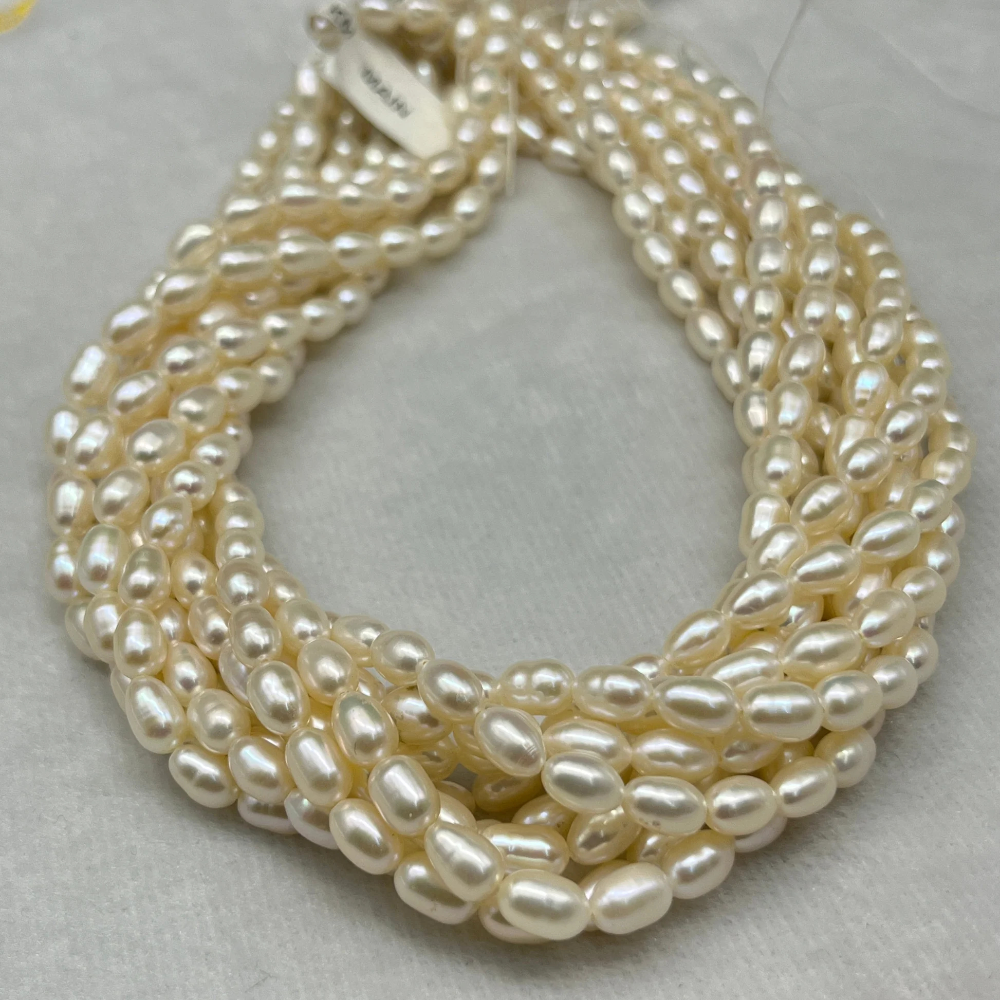 Fresh Water Pearl Cream Color, Rice Shape, AA Luster Pearl, 5-5.5 MM Size