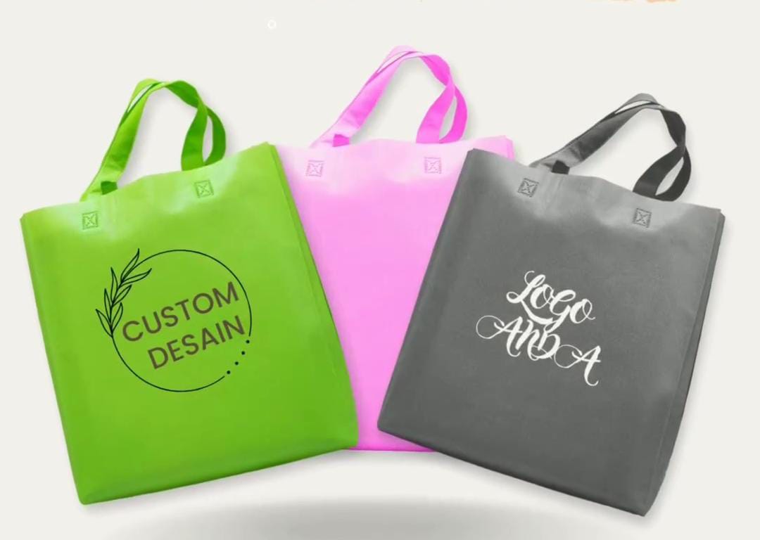 ( 30x40 ) Tas Spunbond Pres Tali Tebal 75 gram include sablon 1 warna dan 1 sisi 