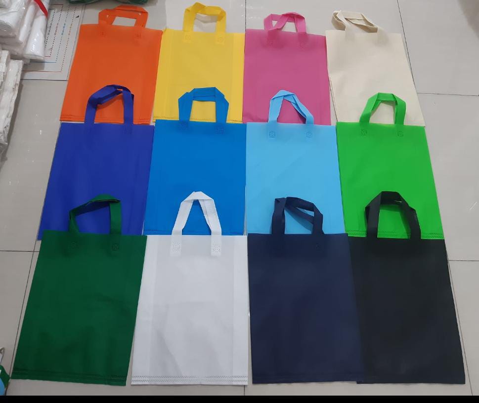 ( 30x40 ) Tas Spunbond Pres Tali Tebal 75 gram include sablon 1 warna dan 1 sisi 