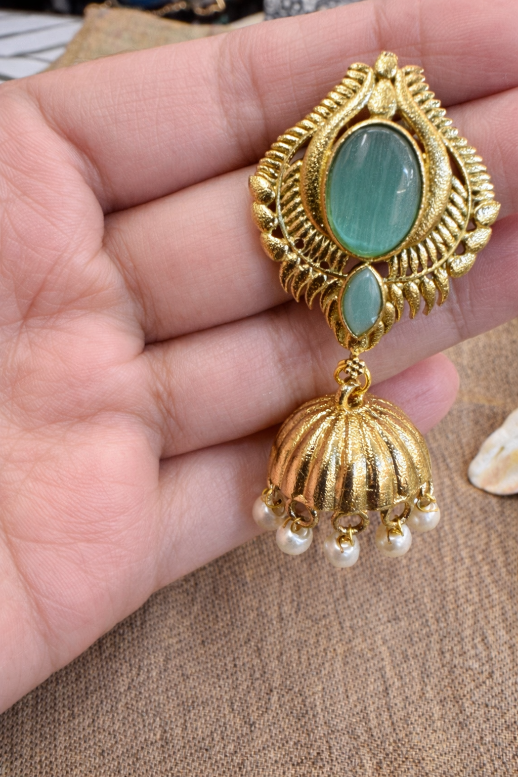 Oxidized Gold-Tone Jhumka Earrings with Mint Stone Accents