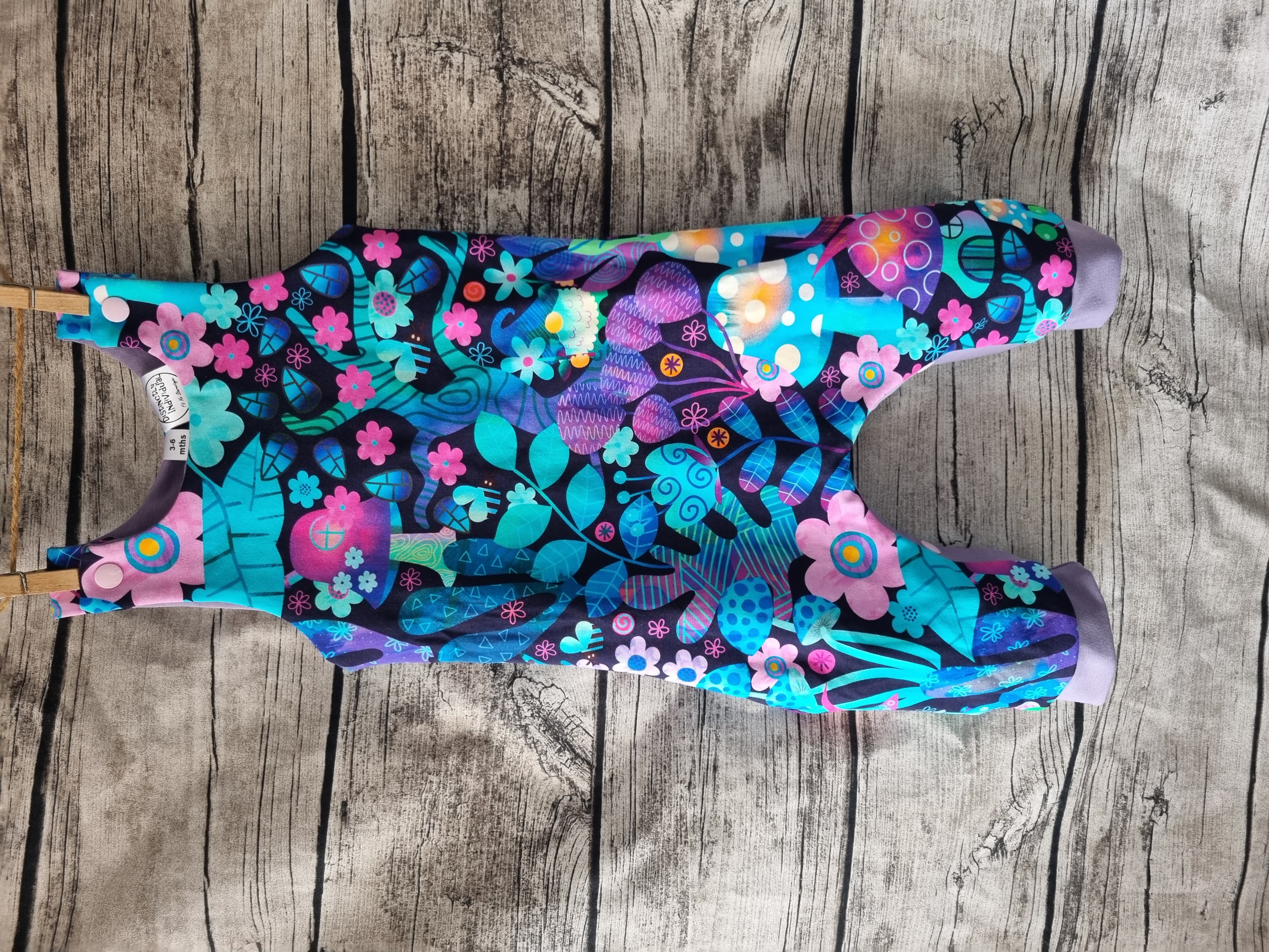 Colourful flower forest girly gonk romper