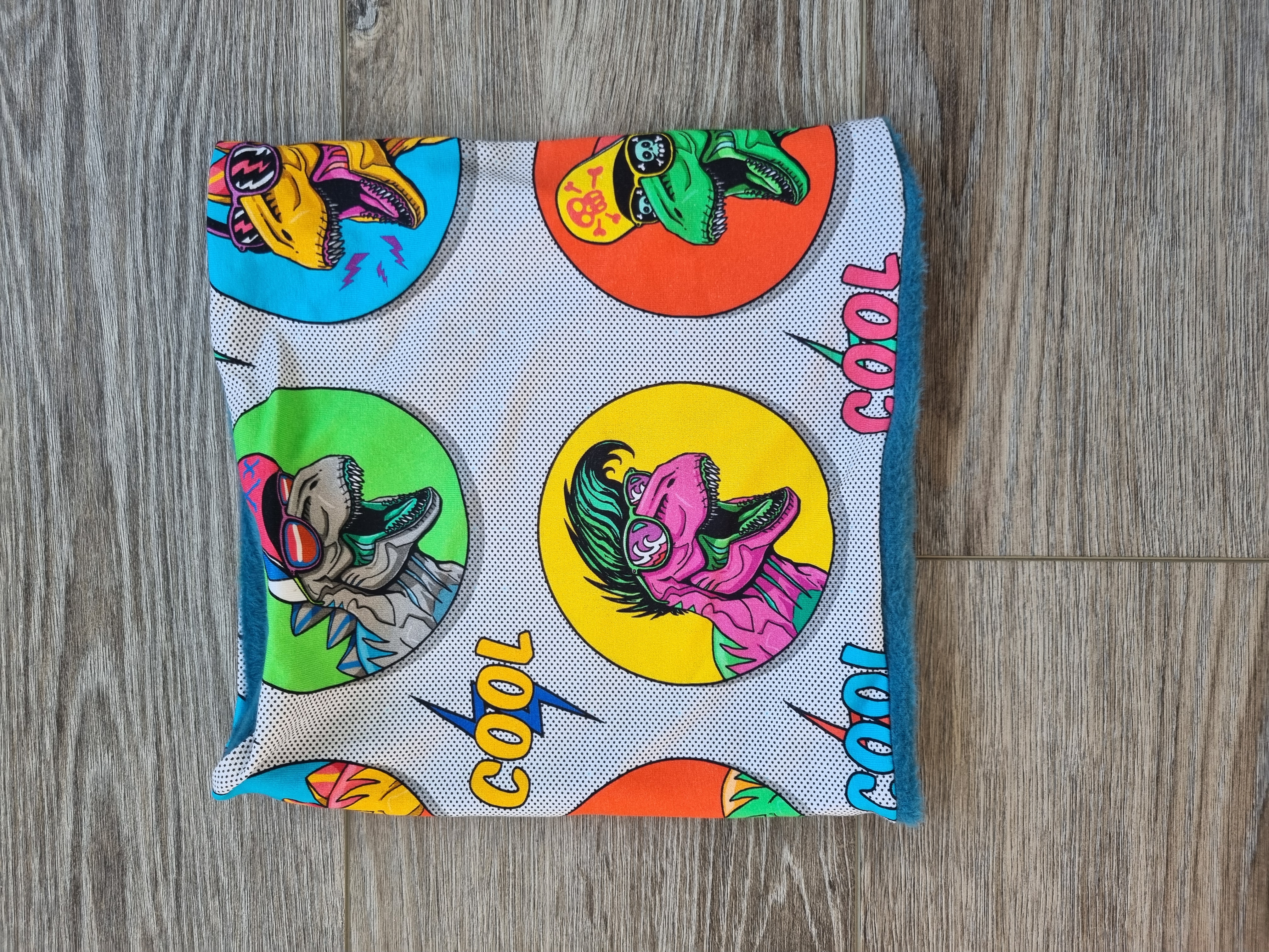 Colourful punk dinosaur snood buff