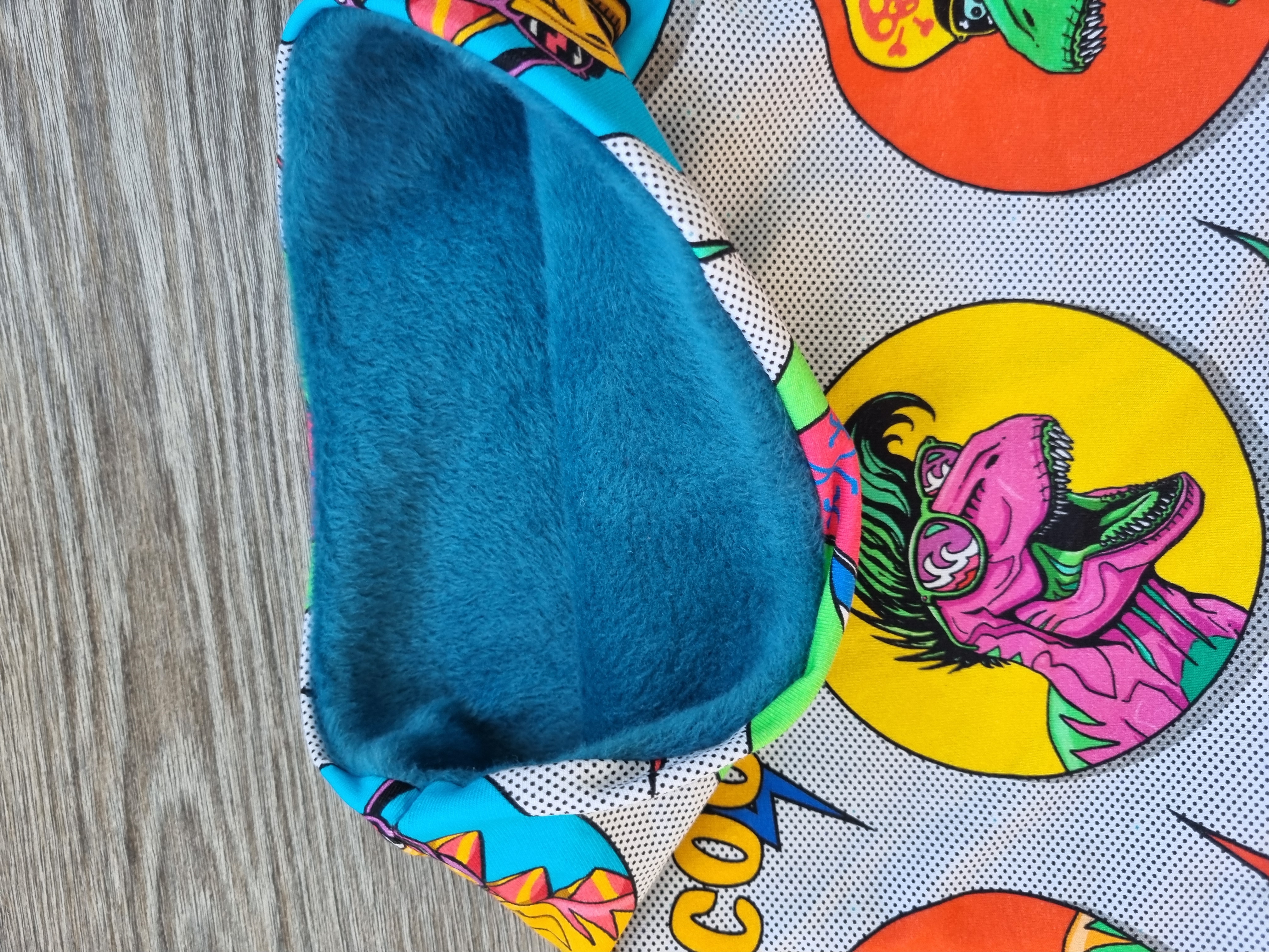 Colourful punk dinosaur snood buff