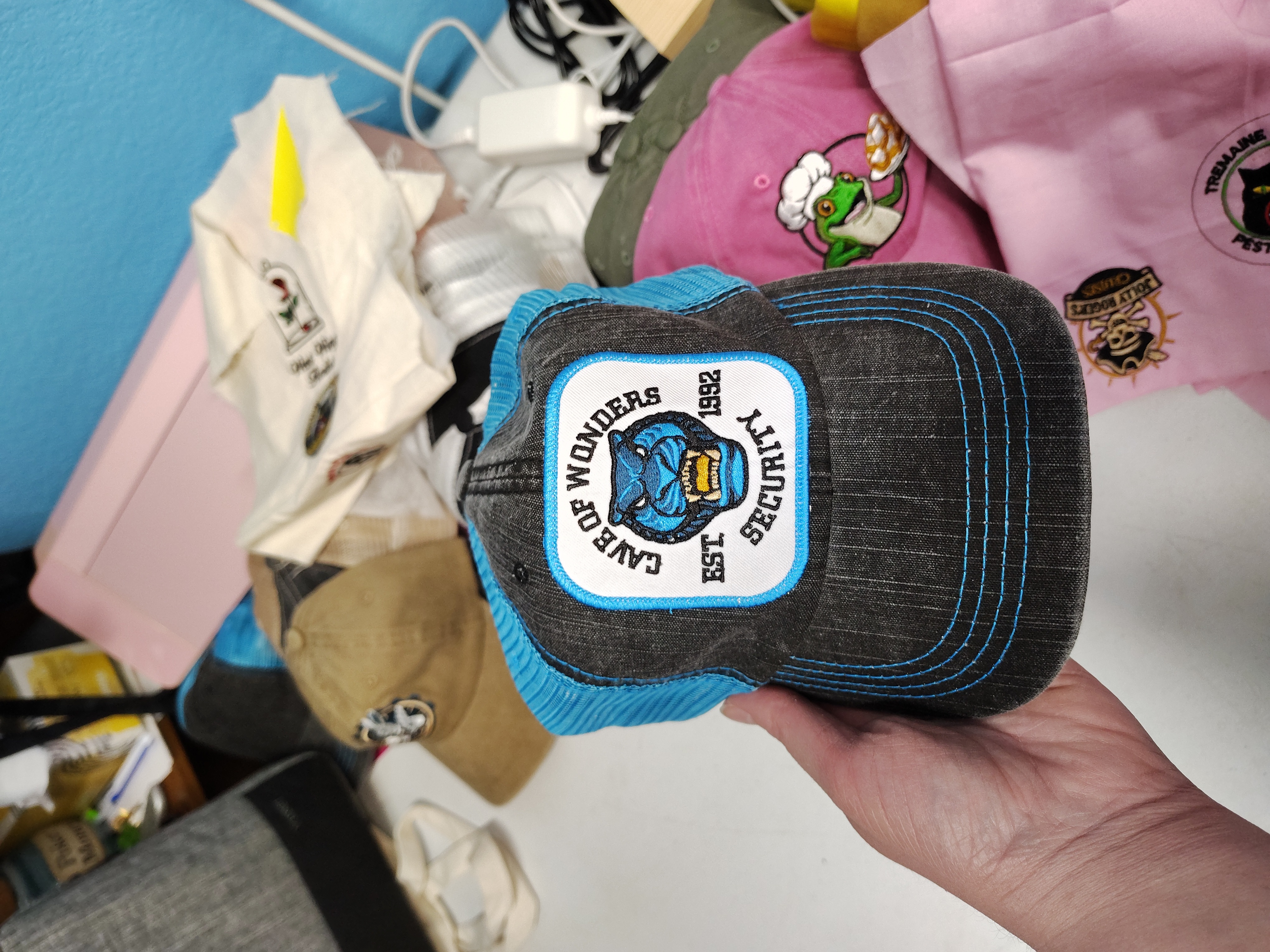 Cave of Wonders Security Patch Hat – Herringbone Cotton Mesh Trucker Cap – Cyan Blue & Black