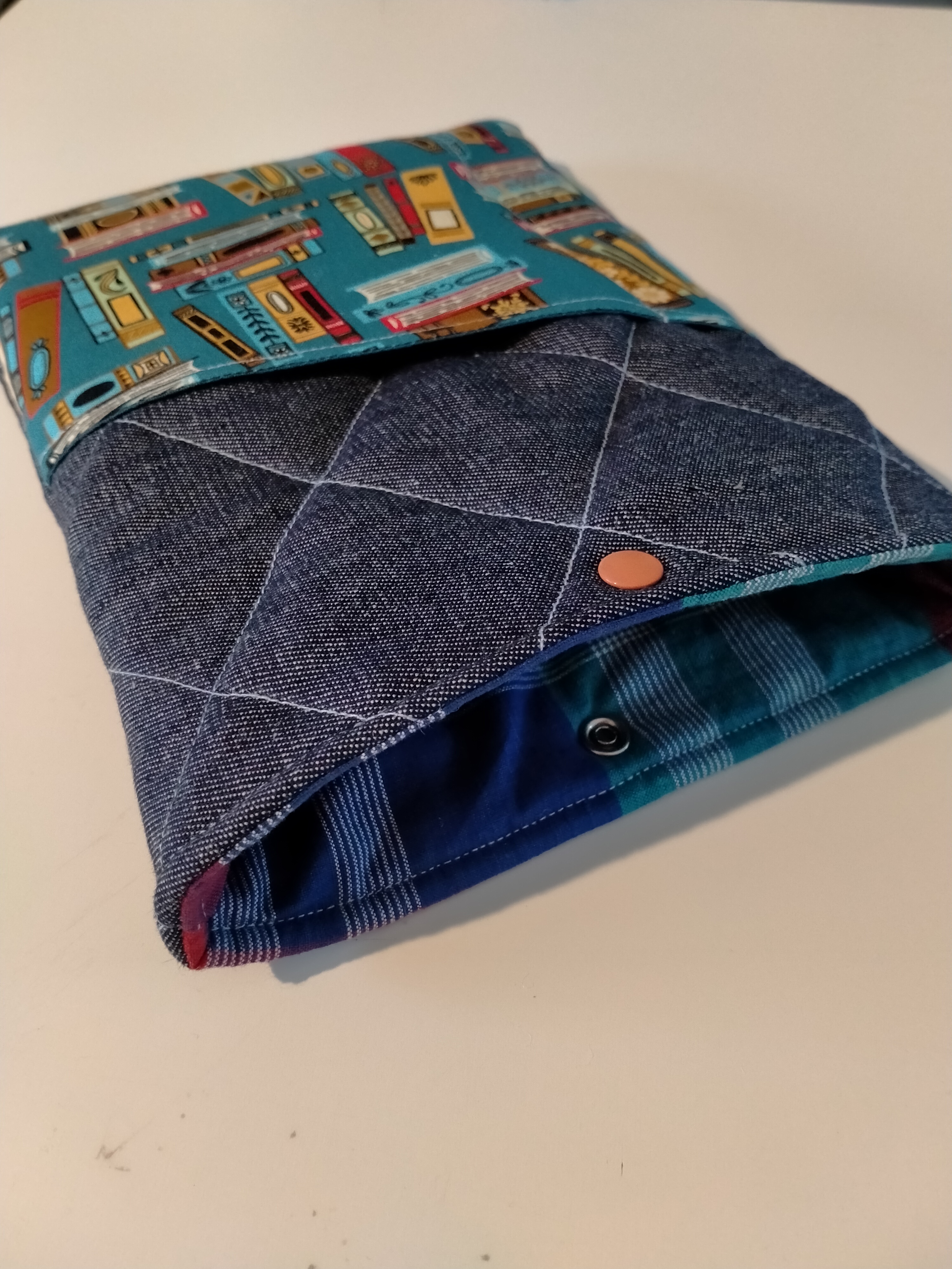 Quilted book Sleeve with a book print