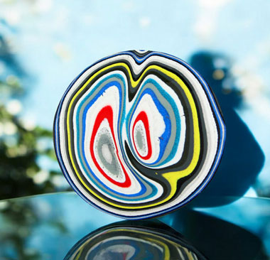 Hand cut Kenworth Fordite Cabochon