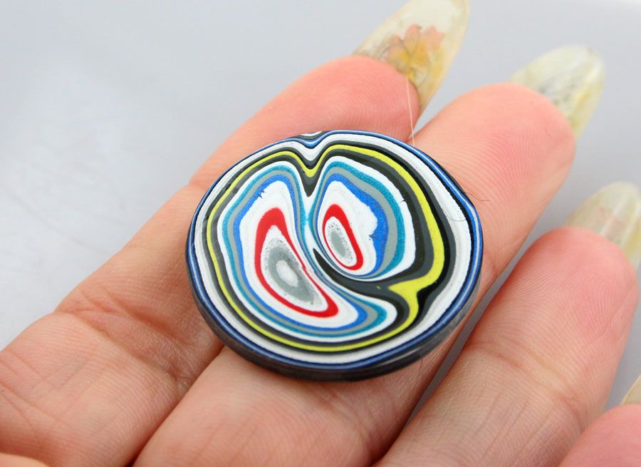 Hand cut Kenworth Fordite Cabochon