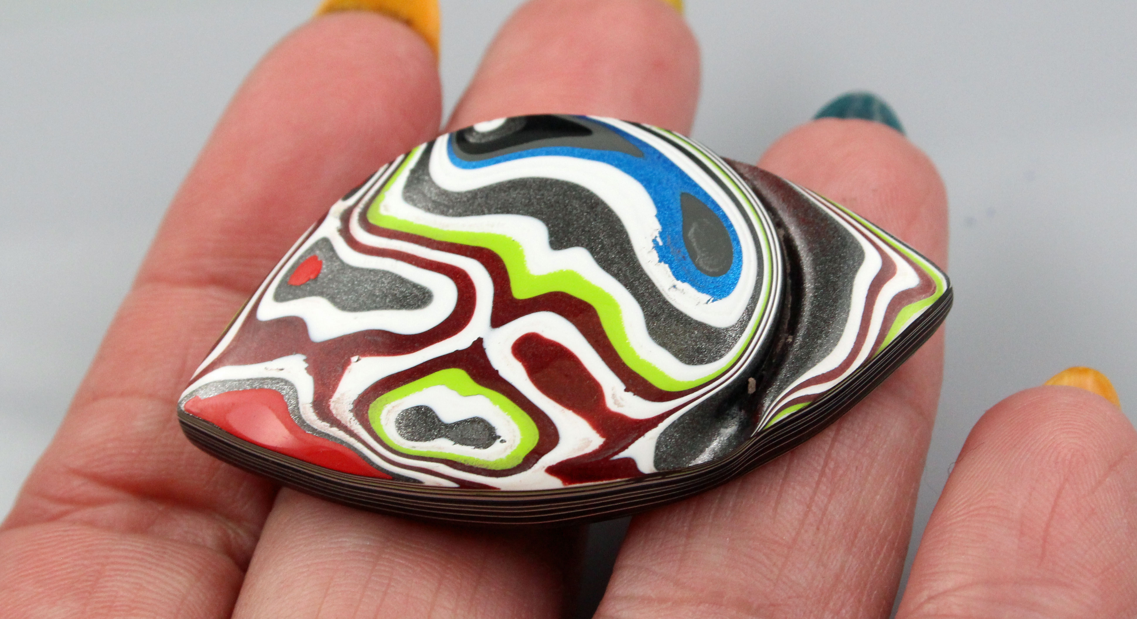 Hand Cut Carved dome  Jeep Fordite 