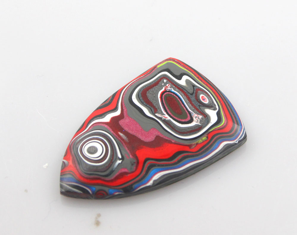 Hand cut metallic Jeep Fordite Cabochon 