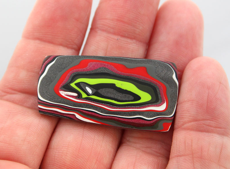 Hand cut metallic Jeep Fordite Cabochon 