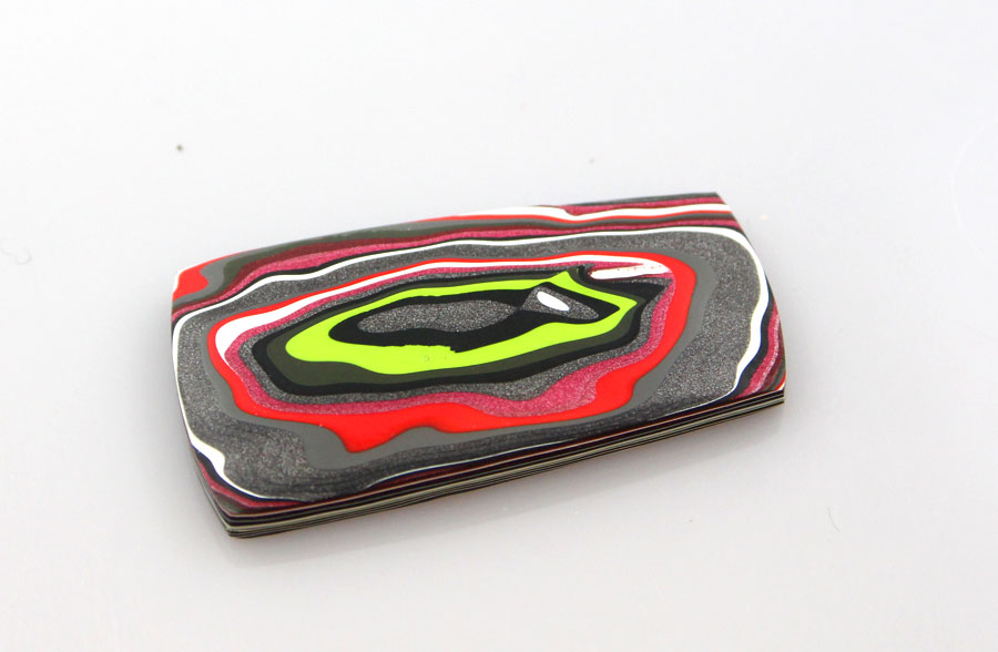 Hand cut metallic Jeep Fordite Cabochon 