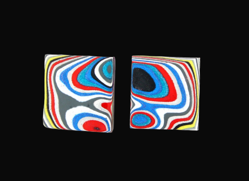 Hand cut Fordite matched pair of cabochons