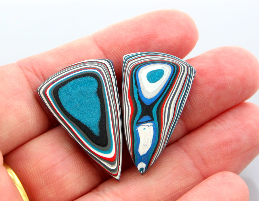 Hand cut Fordite matched pair of cabochons
