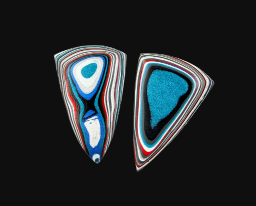 Hand cut Fordite matched pair of cabochons