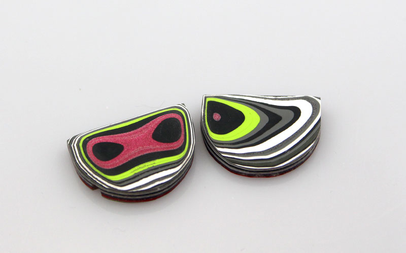 Hand cut Fordite matched pair of cabochons