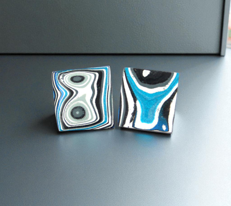 Hand cut Fordite matched pair of cabochons