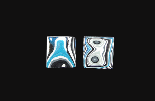 Hand cut Fordite matched pair of cabochons