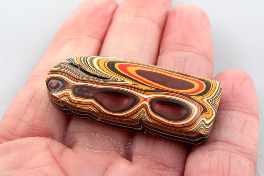 Hand Cut Rare Orange and Metallic Grey Sculpted top Jeep fordite
