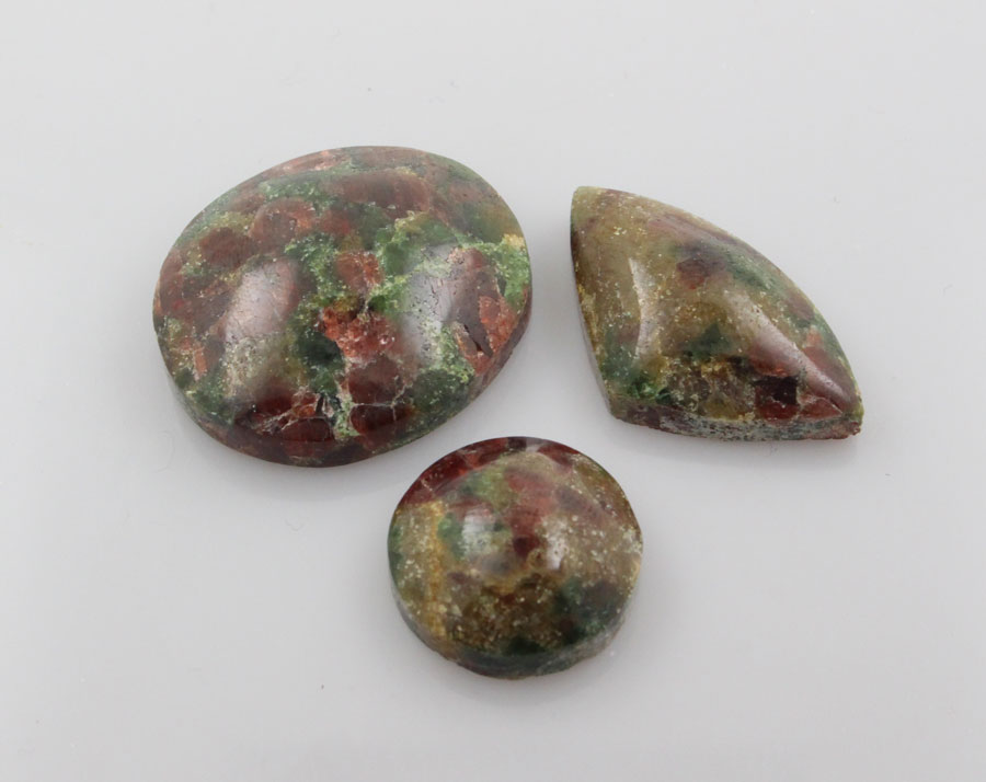 Sale bundle set of three hand cut Ruby In garnett cabochon's 