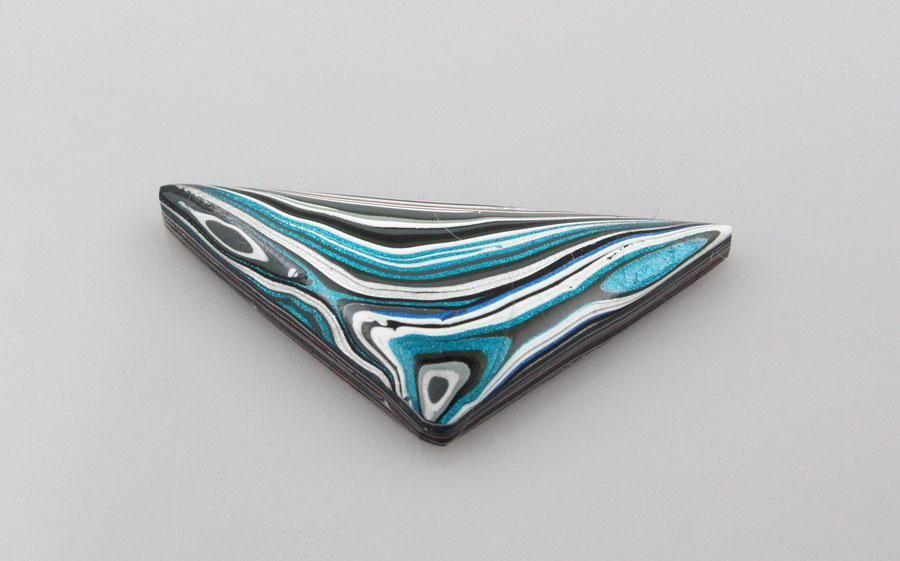 Metallic  Hand Cut Jeep Fordite 