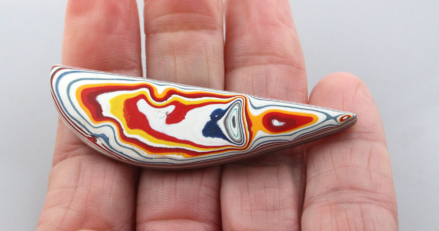 Huge Bright Hand Cut Jeep Fordite 