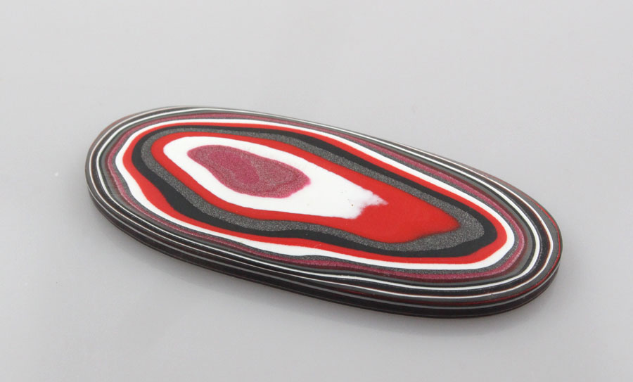 Huge Hand Cut Metallic Red and Pink Jeep Fordite 