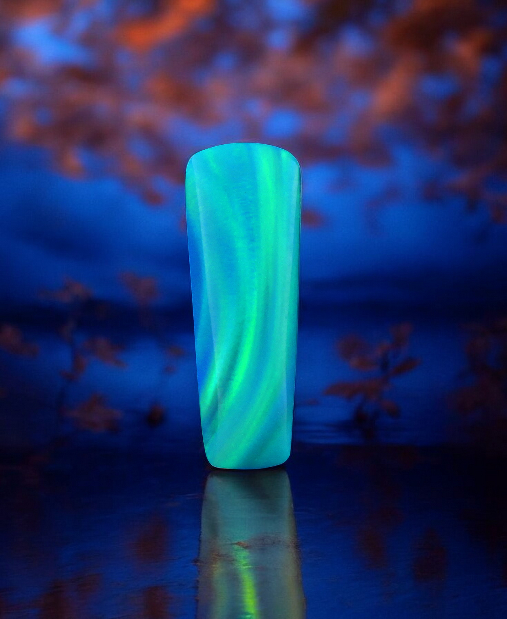 large Aurora Opal cabochon