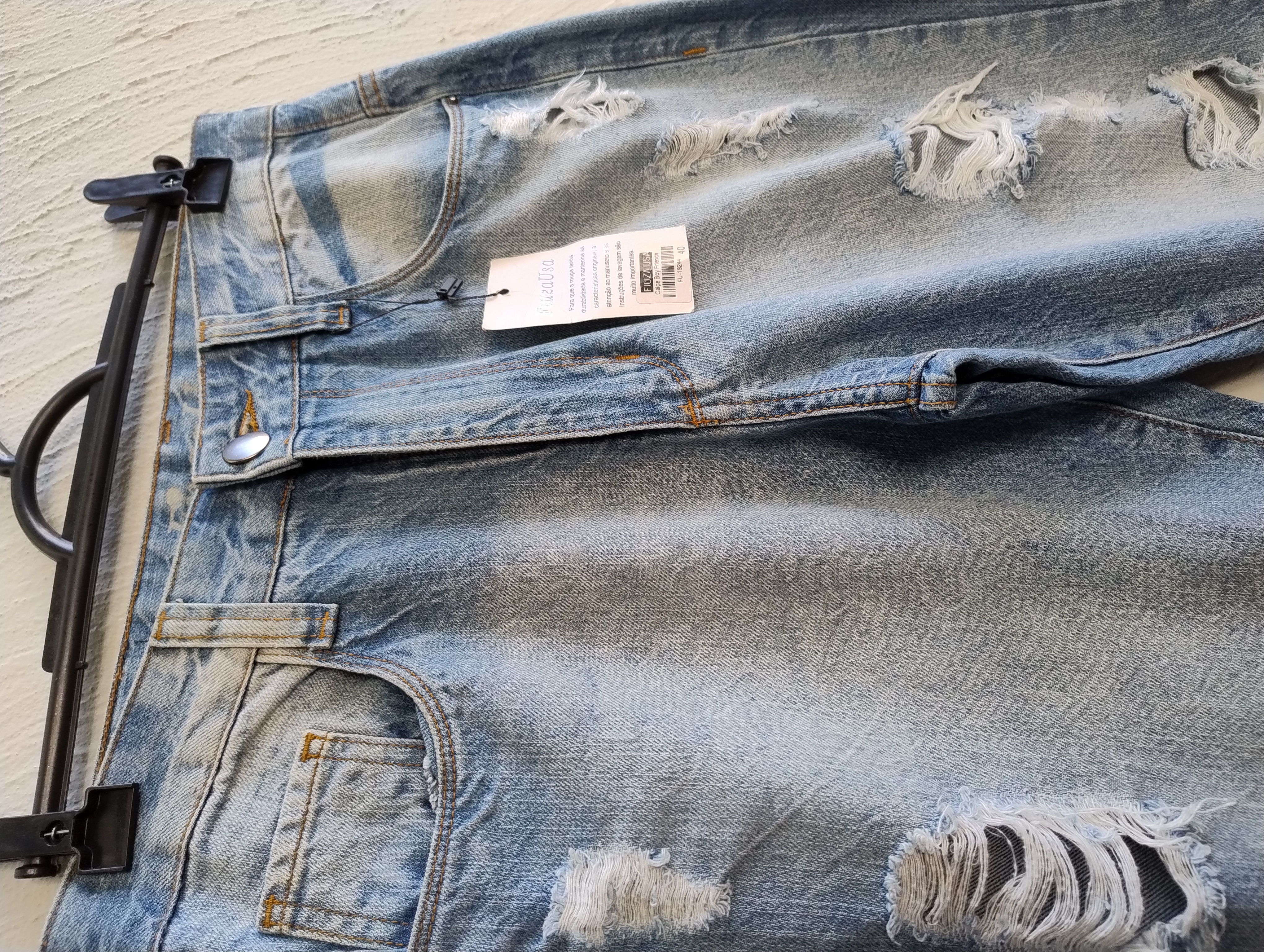 Calça Jeans Rasgada