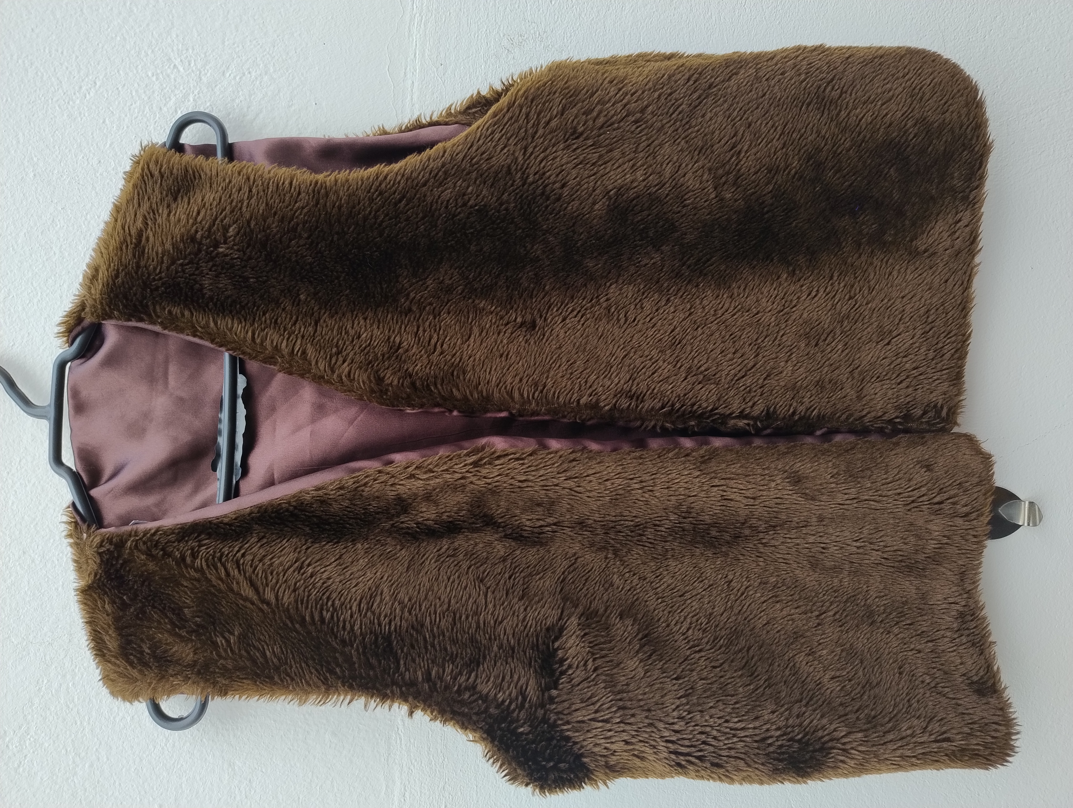 Colete de pele sintética