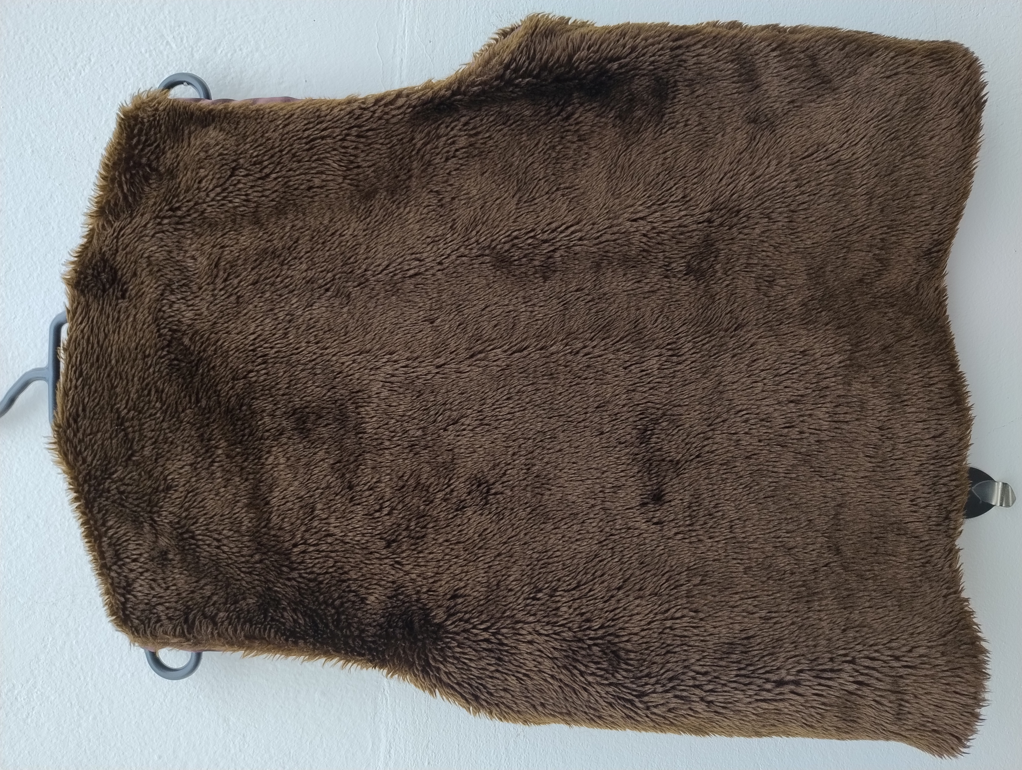 Colete de pele sintética