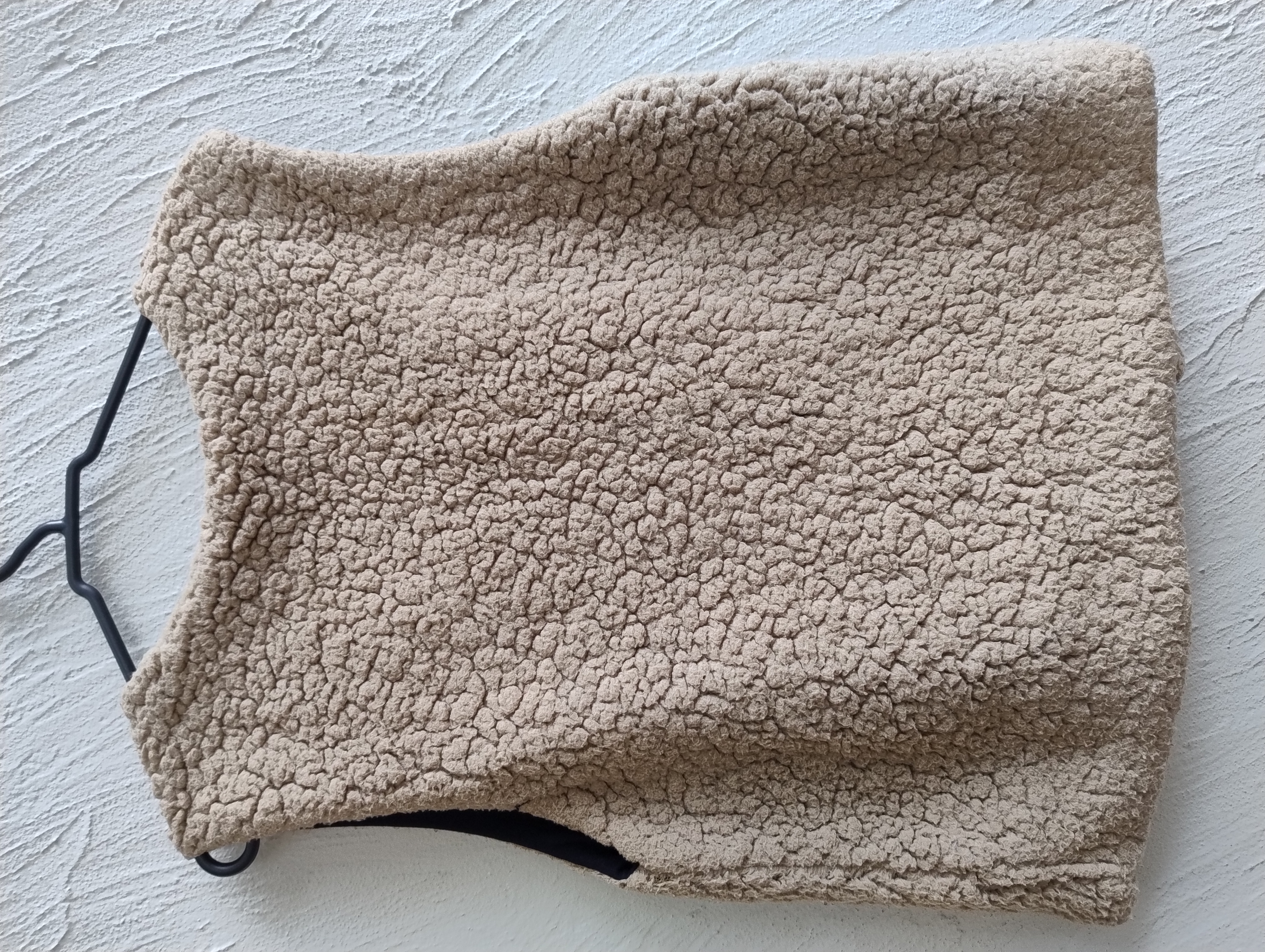 Colete de pelúcia bege