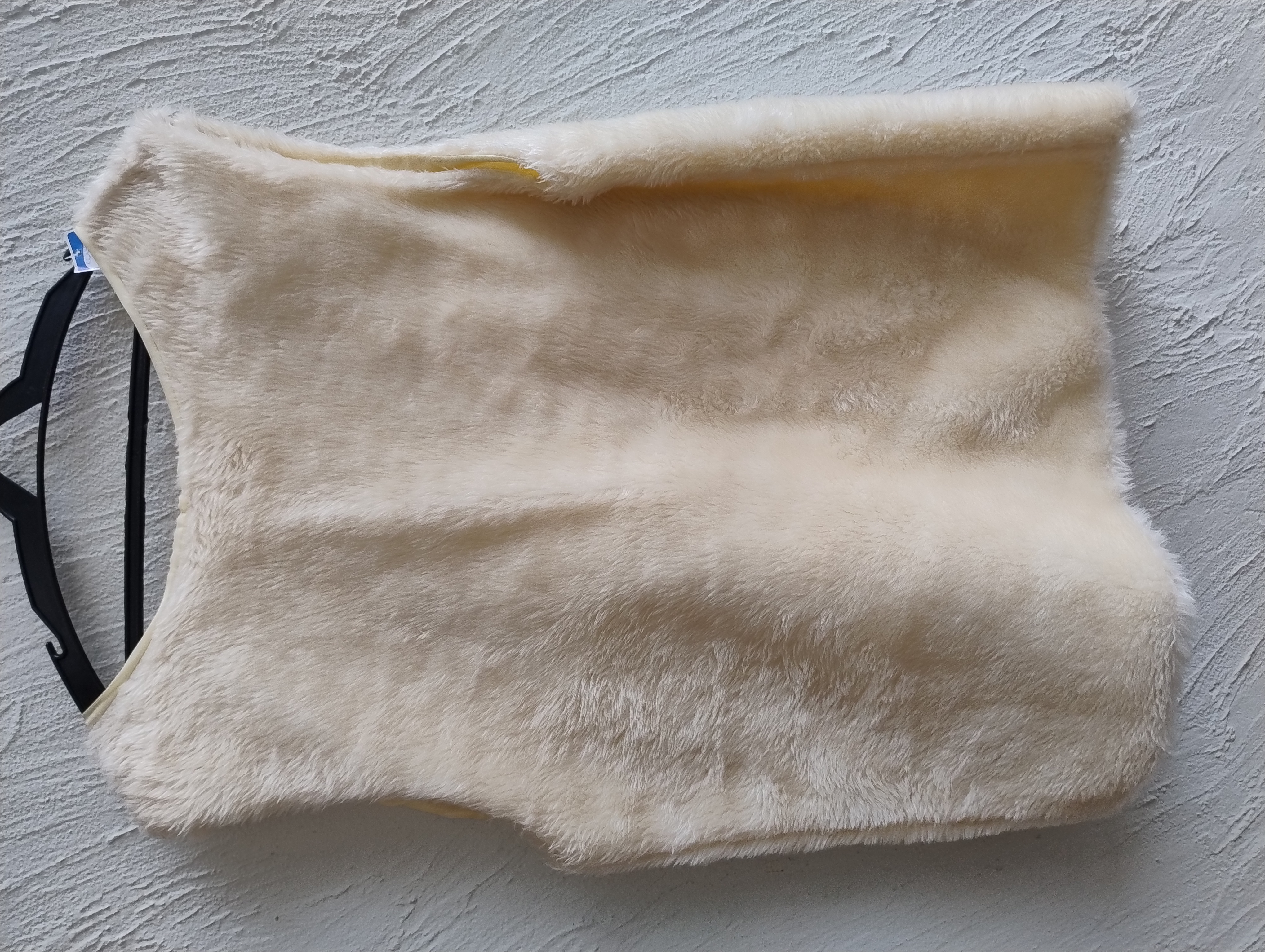 Colete de pelo sintético bege