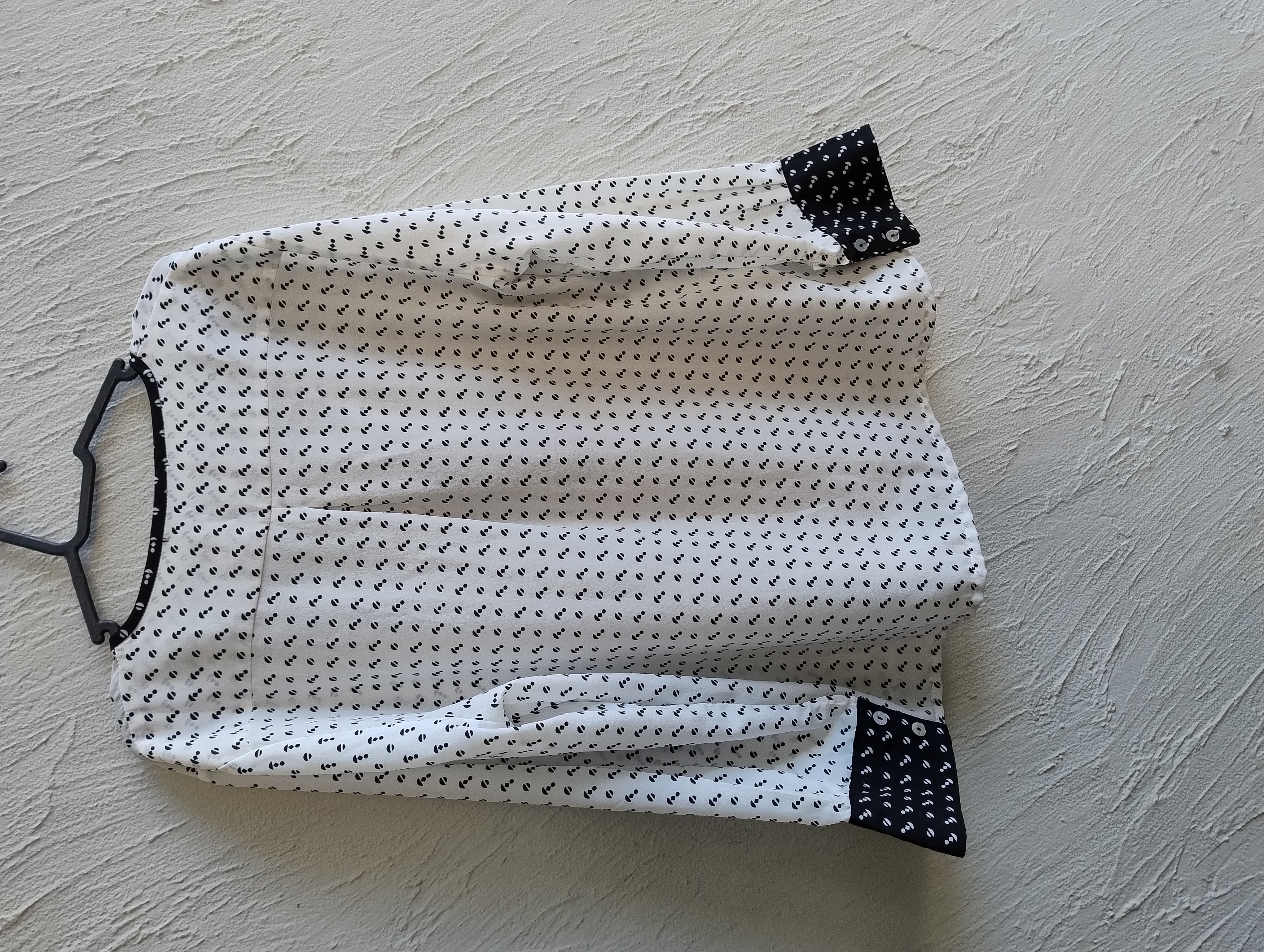 Blusa feminina branca com estampa de âncoras G