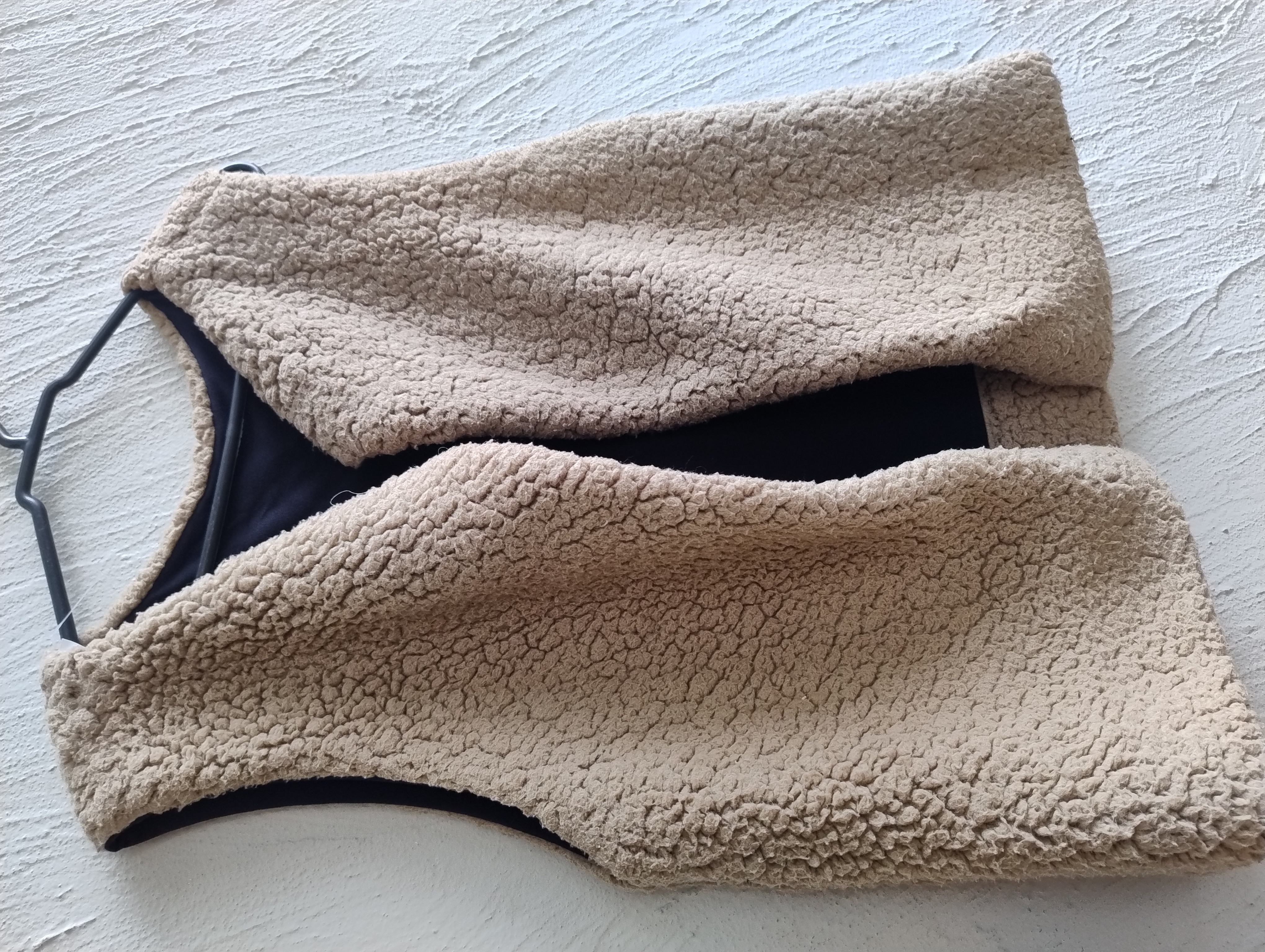 Colete de pelúcia bege