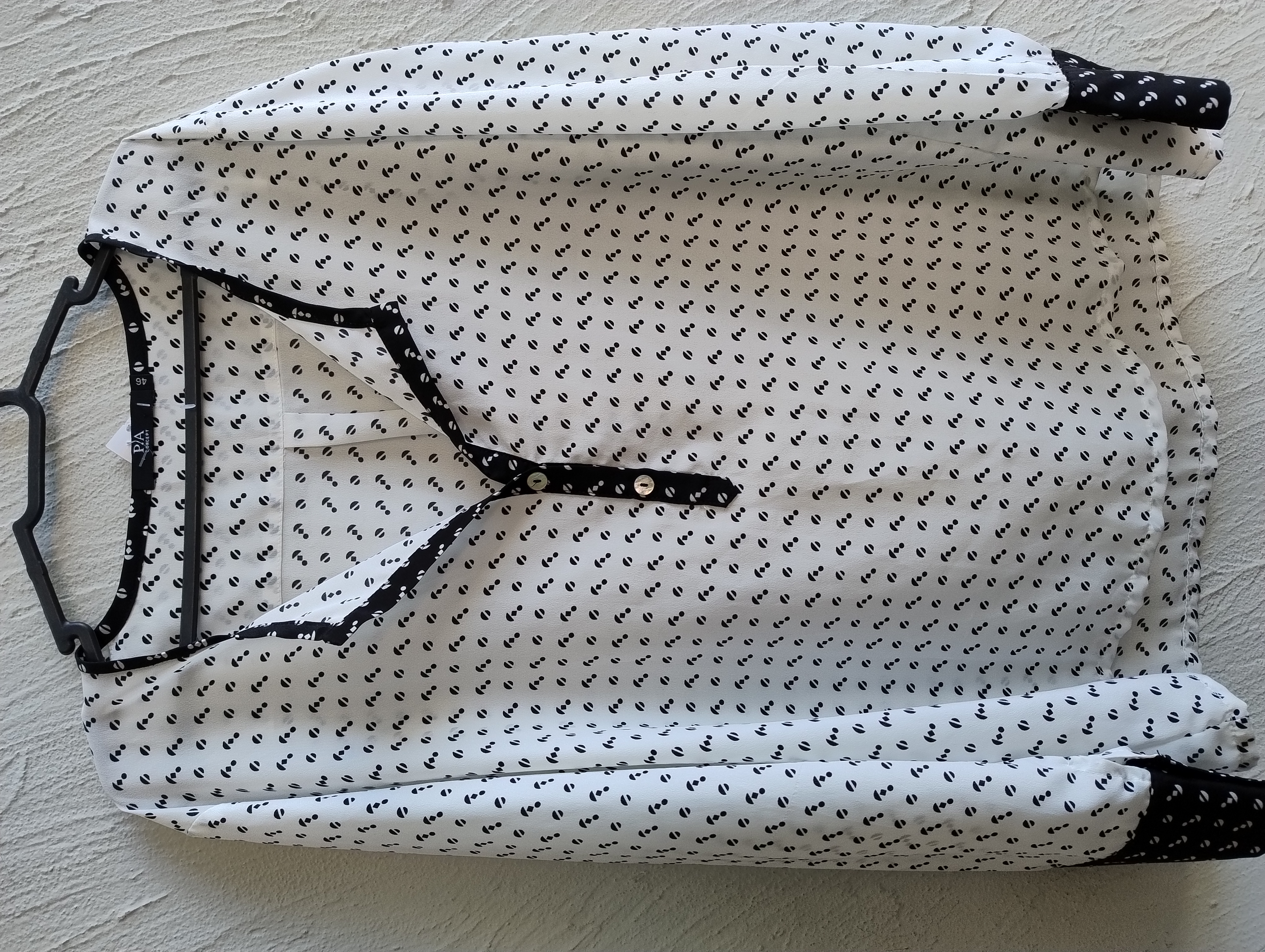 Blusa feminina branca com estampa de âncoras G